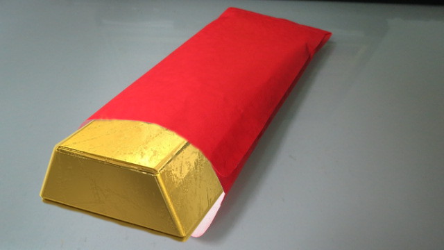 gold bar inside red envelope